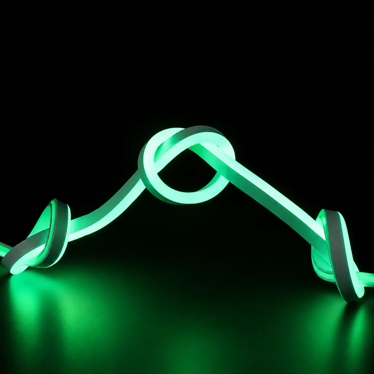 14x26mm green LED neon flex light bent into knots to demonstrate flexibility
