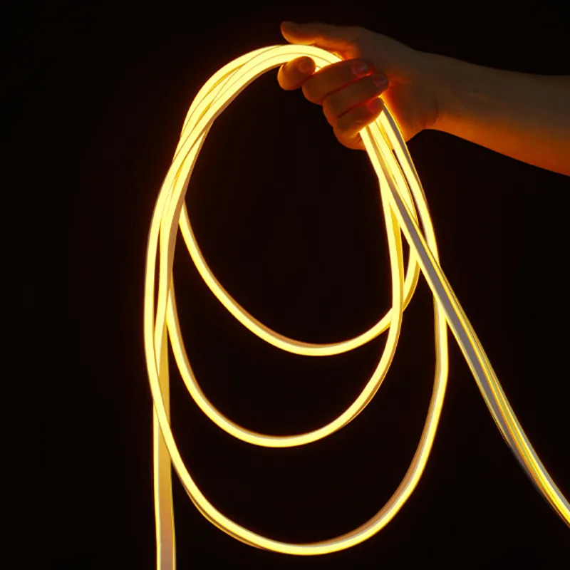 8x16mm double-brightness yellow LED neon flex light held by hand to show flexibility
